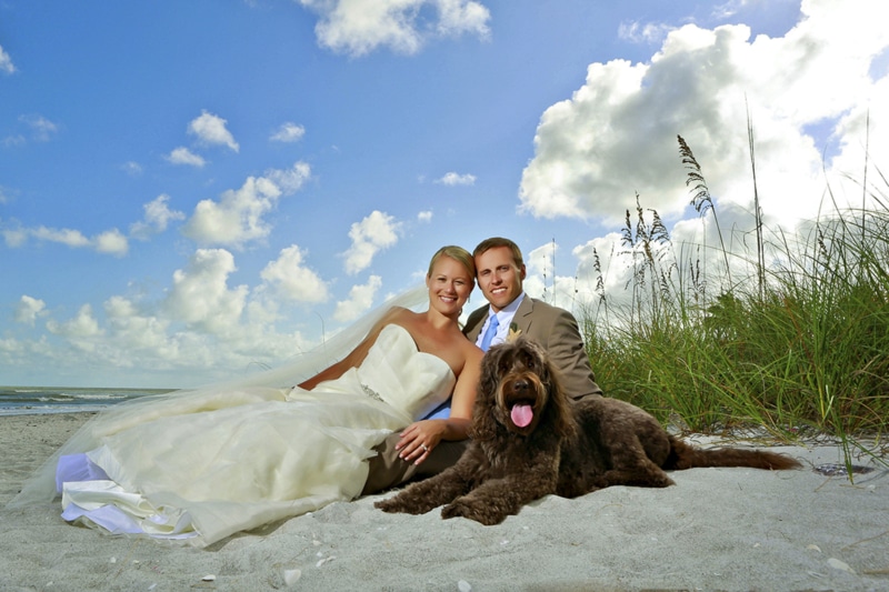 Couple with dog on Sanibel Captiva
